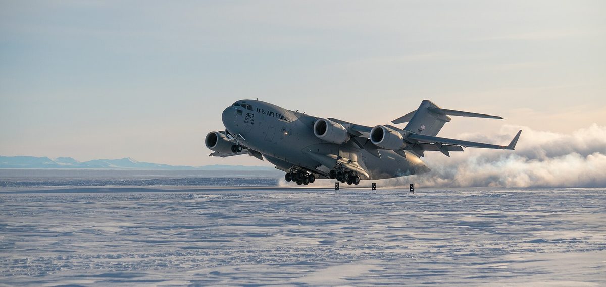 An aircraft taking off from a snow runway in Antarctica