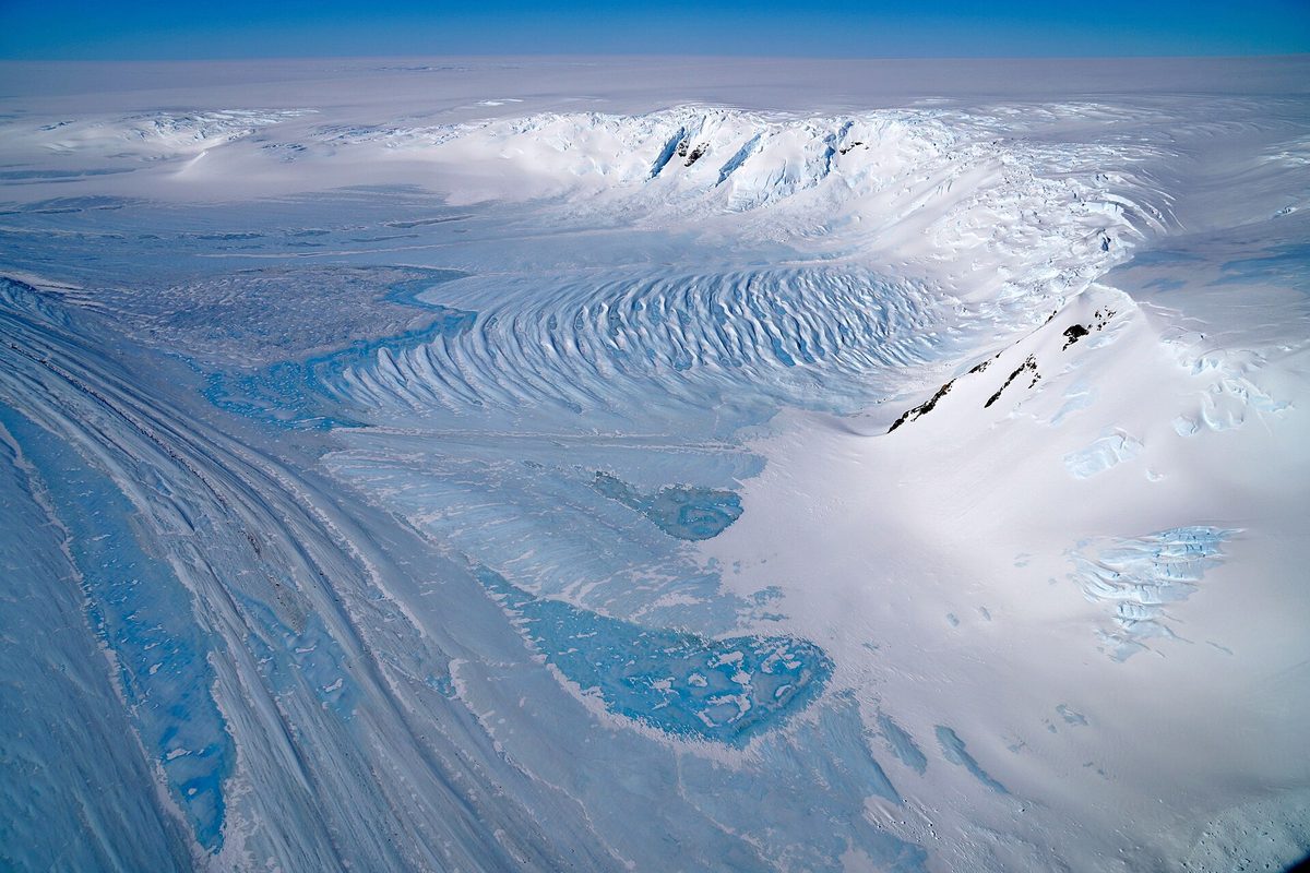 An aerial view of Antarctic mountains and ice