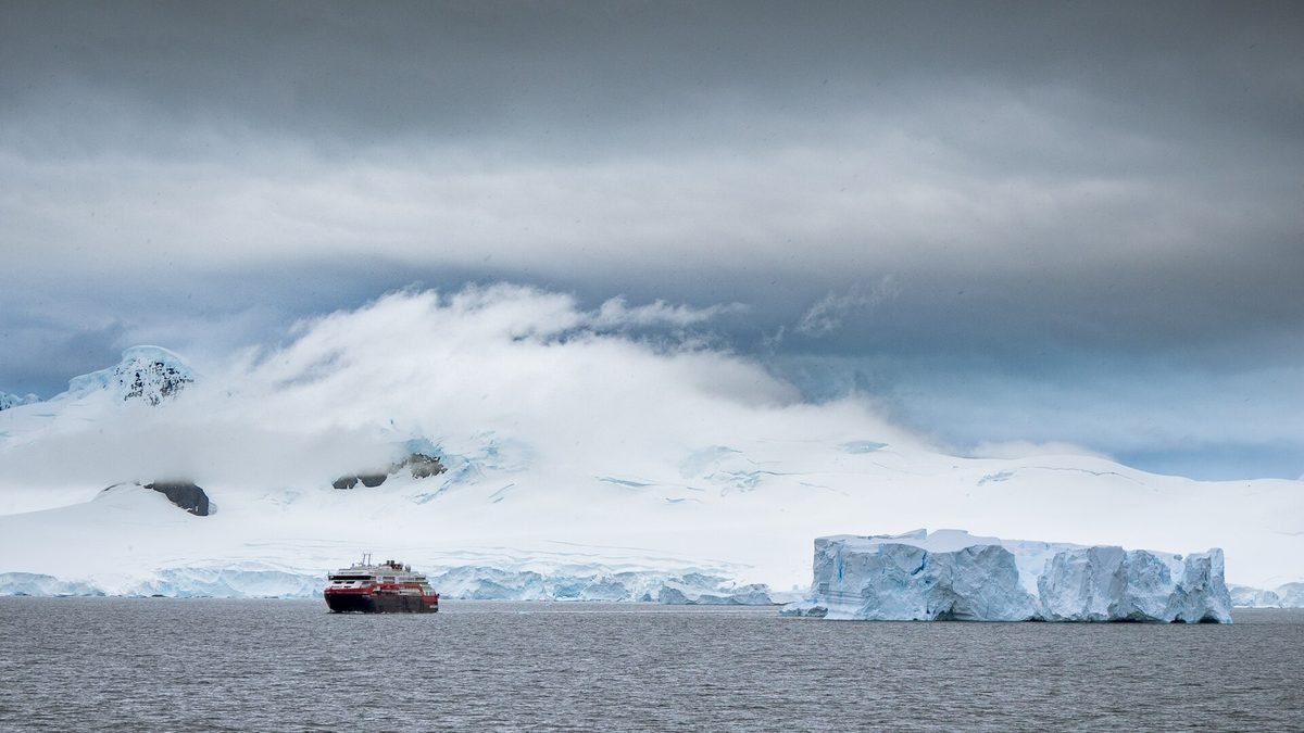Modern hybrid-powered expedition ship at sea