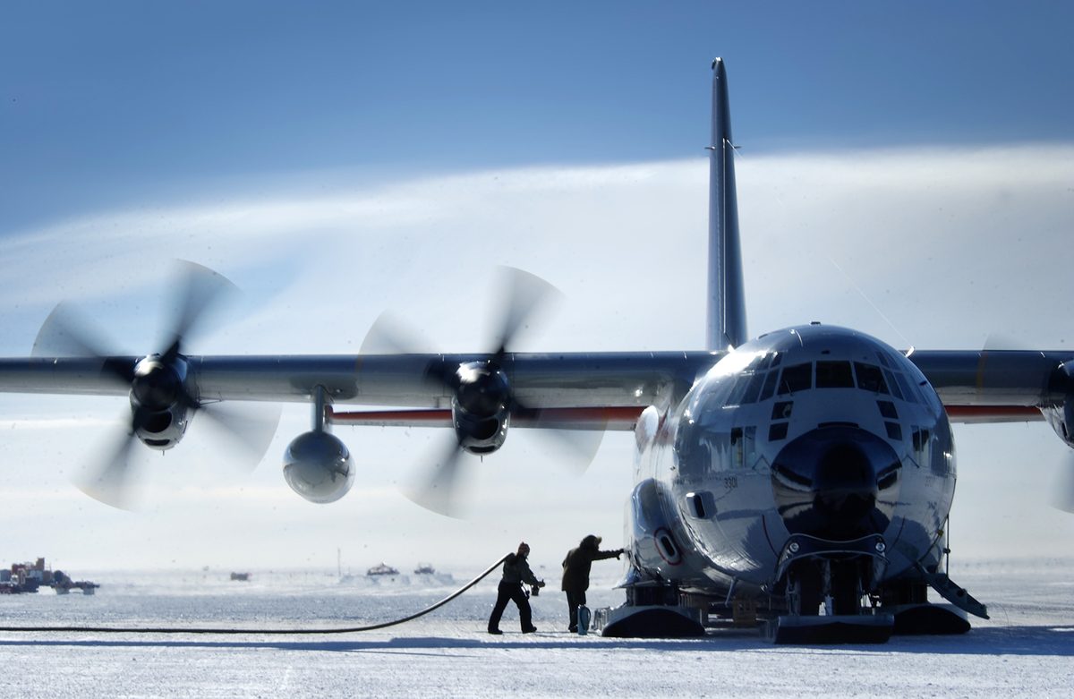 A ski-equipped LC-130 Hercules aircraft on the Antarctic ice