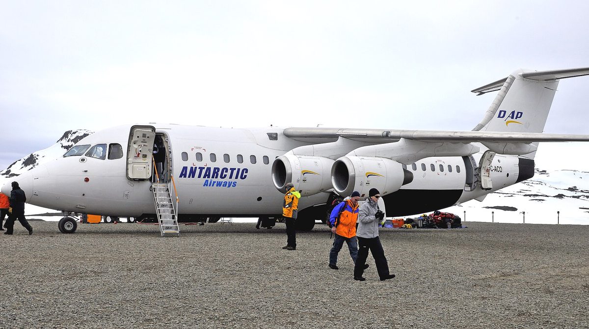 An aircraft on the gravel airstrip at King George Island, Antarctica