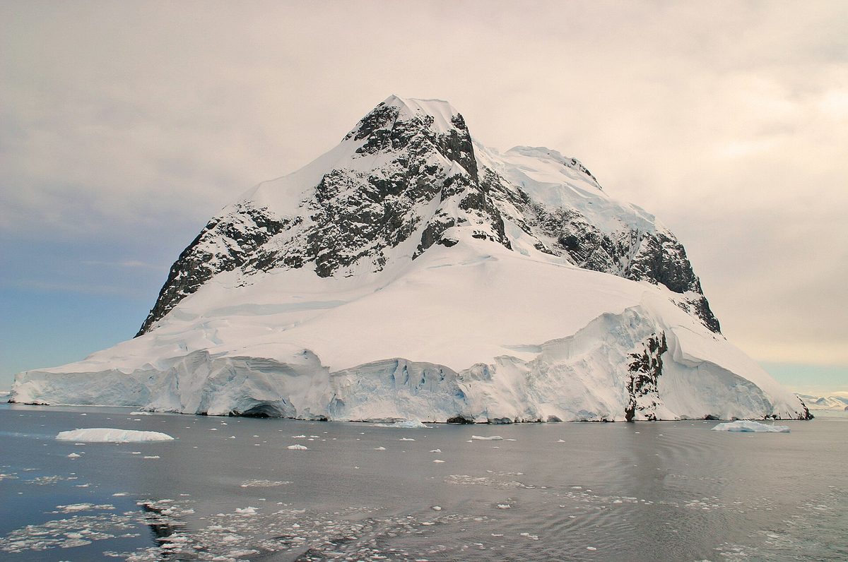 An expedition ship in an Antarctic channel