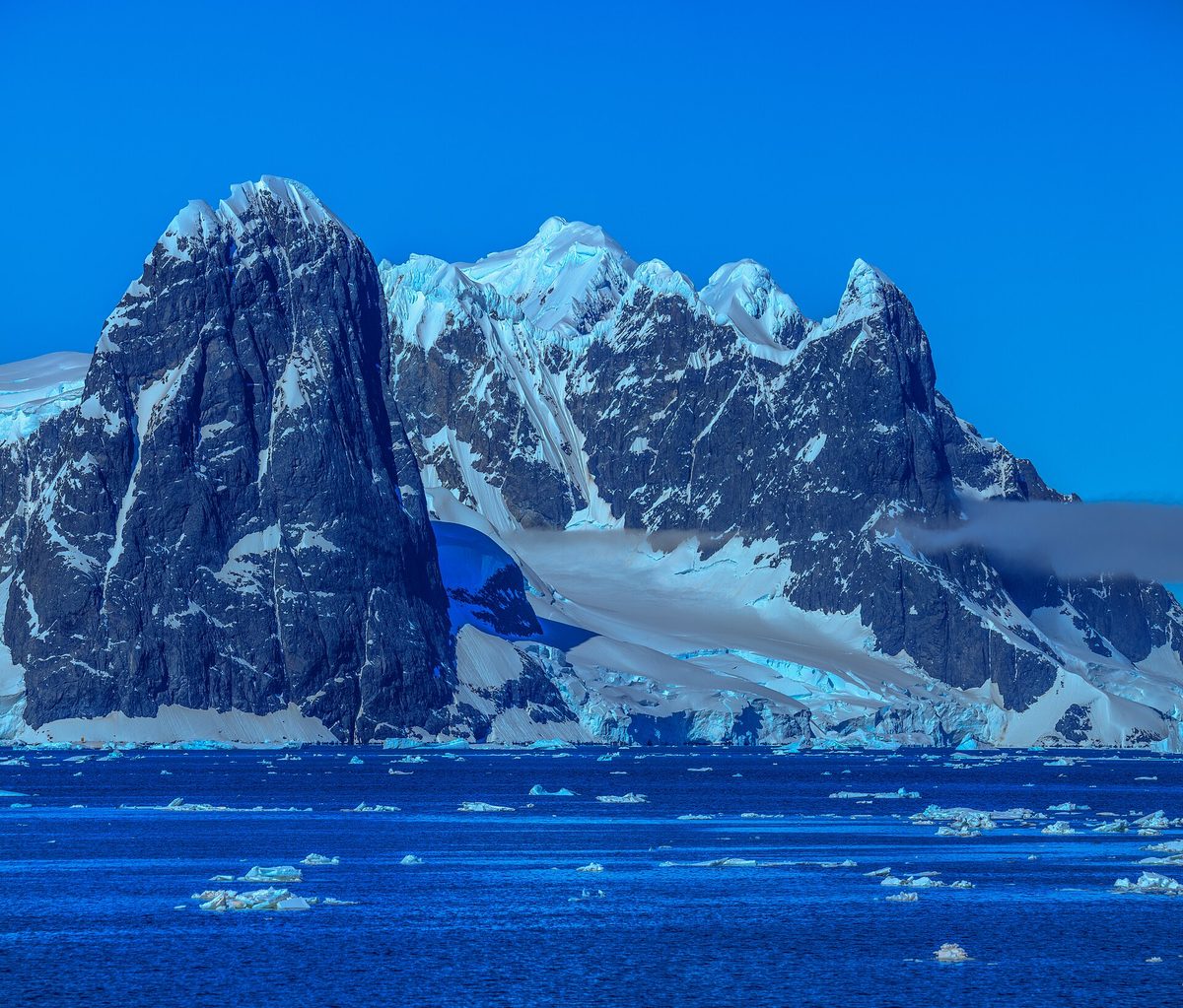 Snow-covered peaks lining the Gerlache Strait on the Antarctic Peninsula