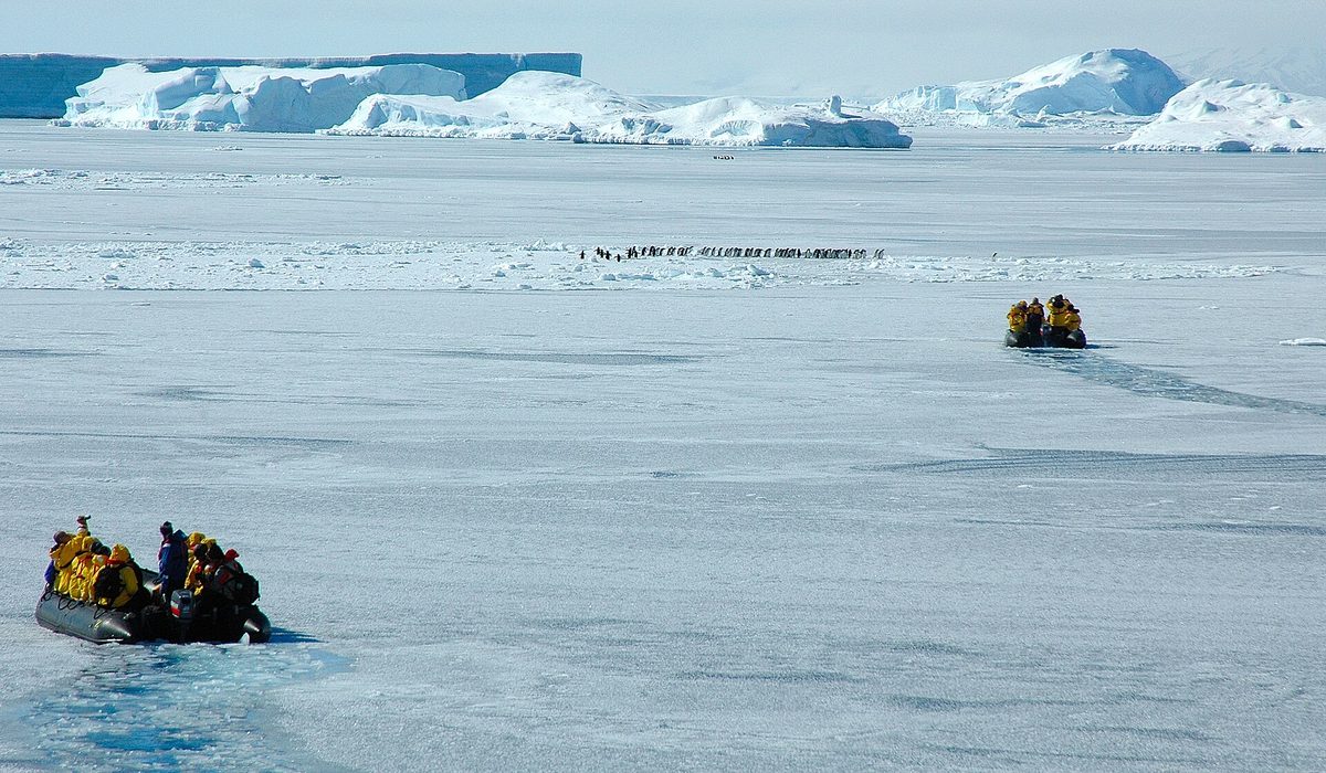 Travellers in a Zodiac inflatable boat during an Antarctic landing